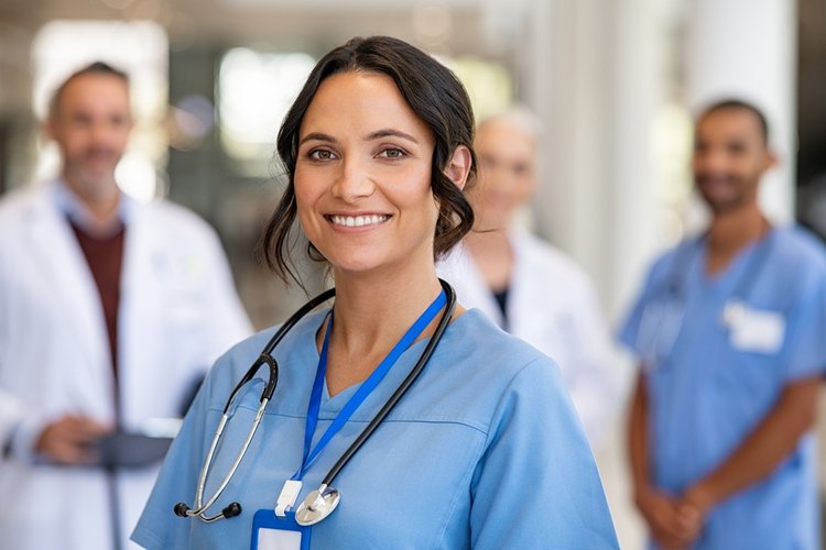 female VA nurse with medical professionals